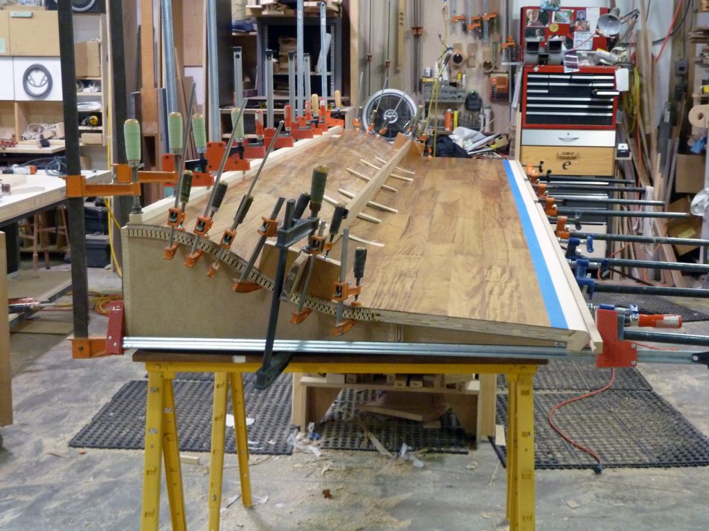 The making of a unique, seamless floor to workdesk curved countertop